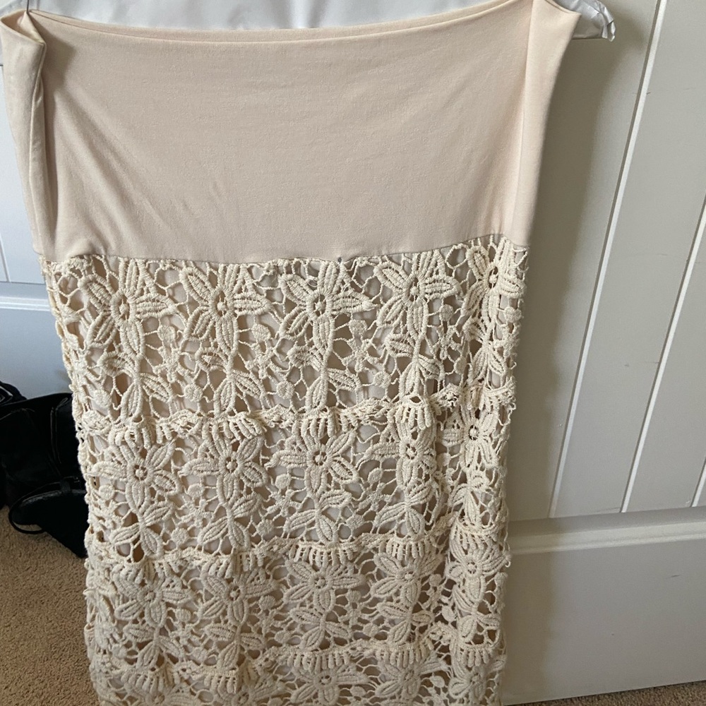 Cream colored size small crochet skirt.